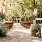 Outdoor wedding setup with decorations.