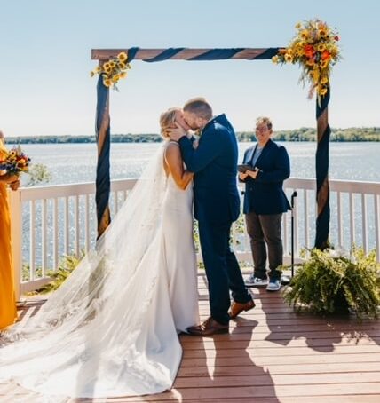 Couple kissing at outdoor wedding, Wedding Ceremony Coverage