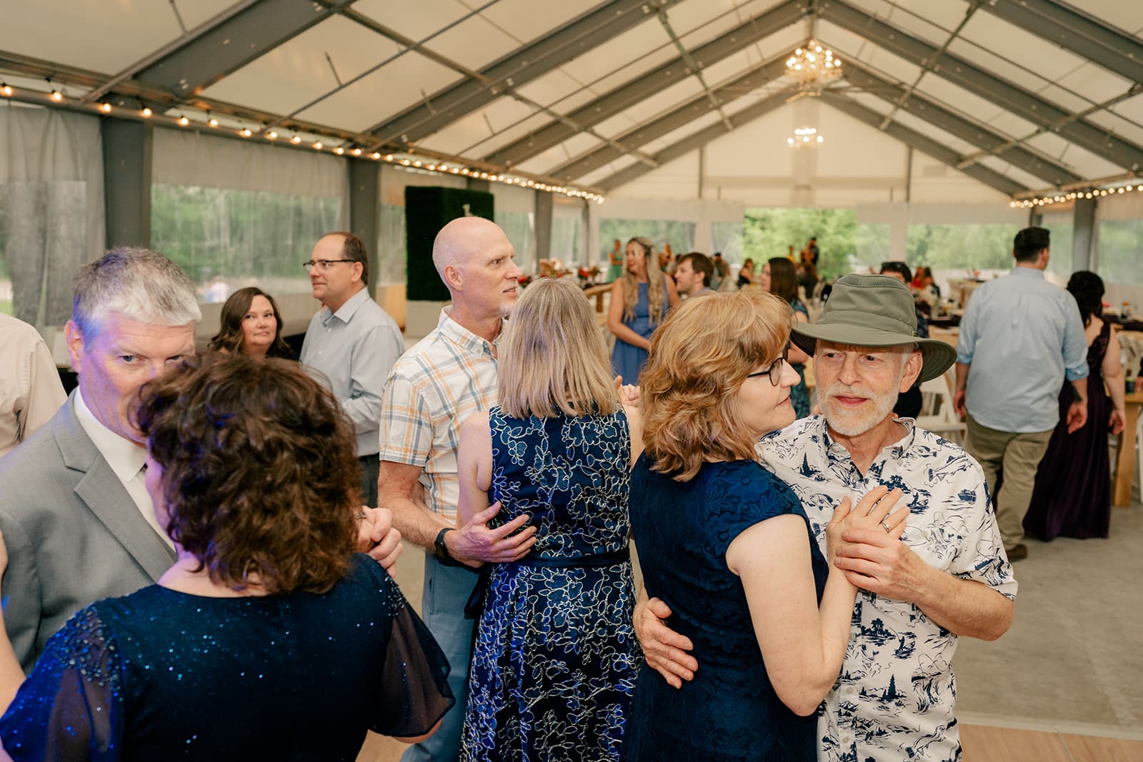 People dancing at a wedding reception.