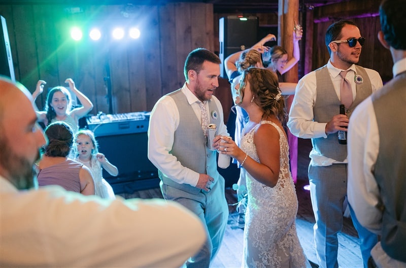 Wedding celebration with dancing guests.