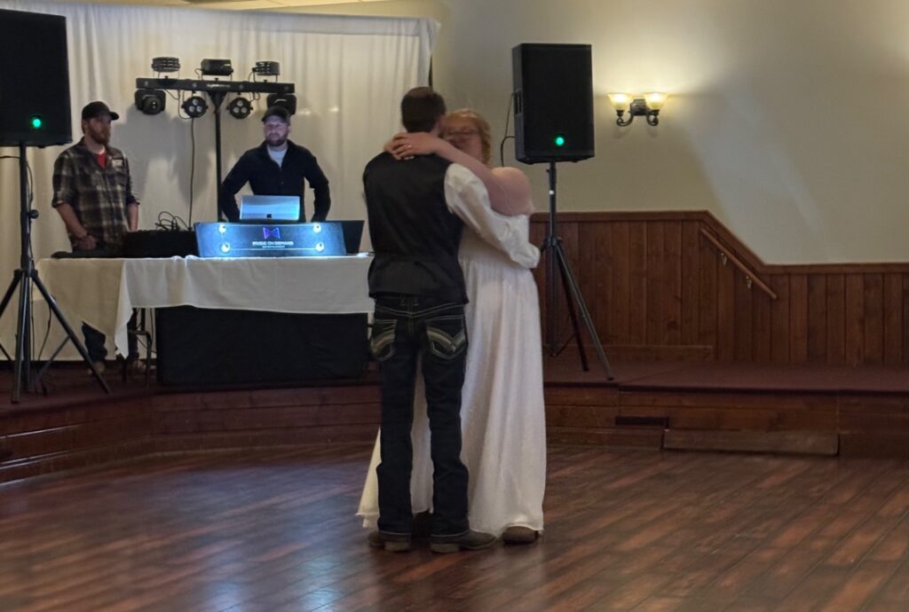 Couple dancing at a wedding reception.