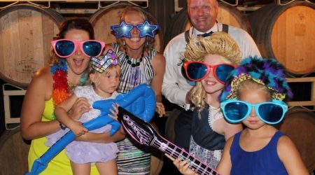 Group wearing fun costumes and props