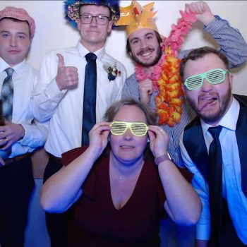Group of people celebrating together. Photo booth rental
