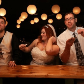 Wedding celebration with joyful guests.