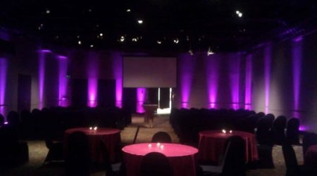 Elegant event space with purple lighting