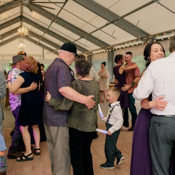 Wedding reception with dancing guests.